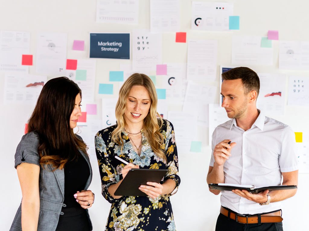 business-people-planning-a-marketing-strategy-K7LBSM2-scaled Business people planning a marketing strategy